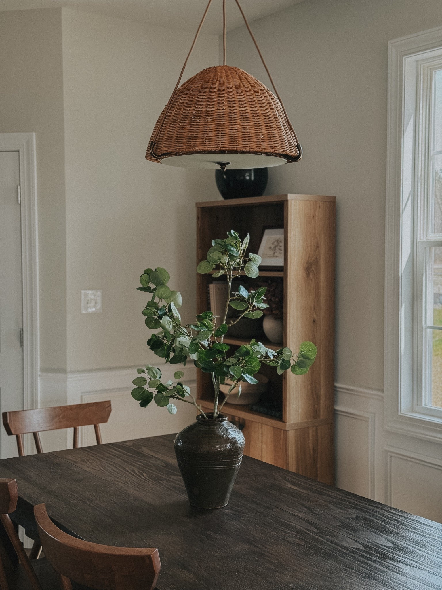Our dining pendant light from adds such a pretty warmth and texture to this space. These stems are my favorite. So realistic and heavy duty. This is just one stem styled here in my vintage jar  