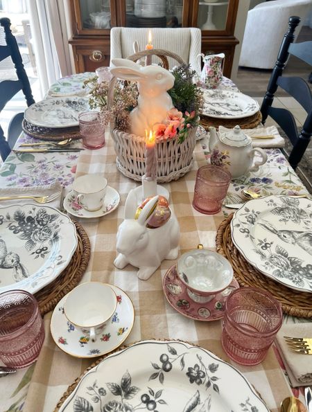 Easter table 2024. Ceramic bunnies, wild floral table cloth, bunny dinner plates. Vintage tea cups Pink water glasses  

#LTKhome #LTKstyletip