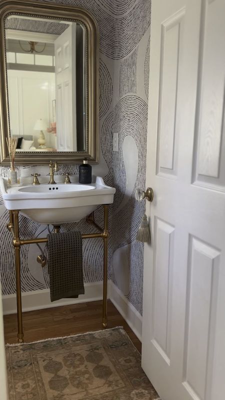 Powder room reveal day!  Here are links to pieces I’ve used. 




Brass widespread faucets, brass console sink, Amazon, tassel glass door knob, Ballard designs, Louis Mirror, hinkley lighting, vanity, lighting, alabaster lighting

#LTKHome