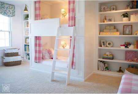 Girls bunk room built in bunk beds with pink Buffalo check curtains 