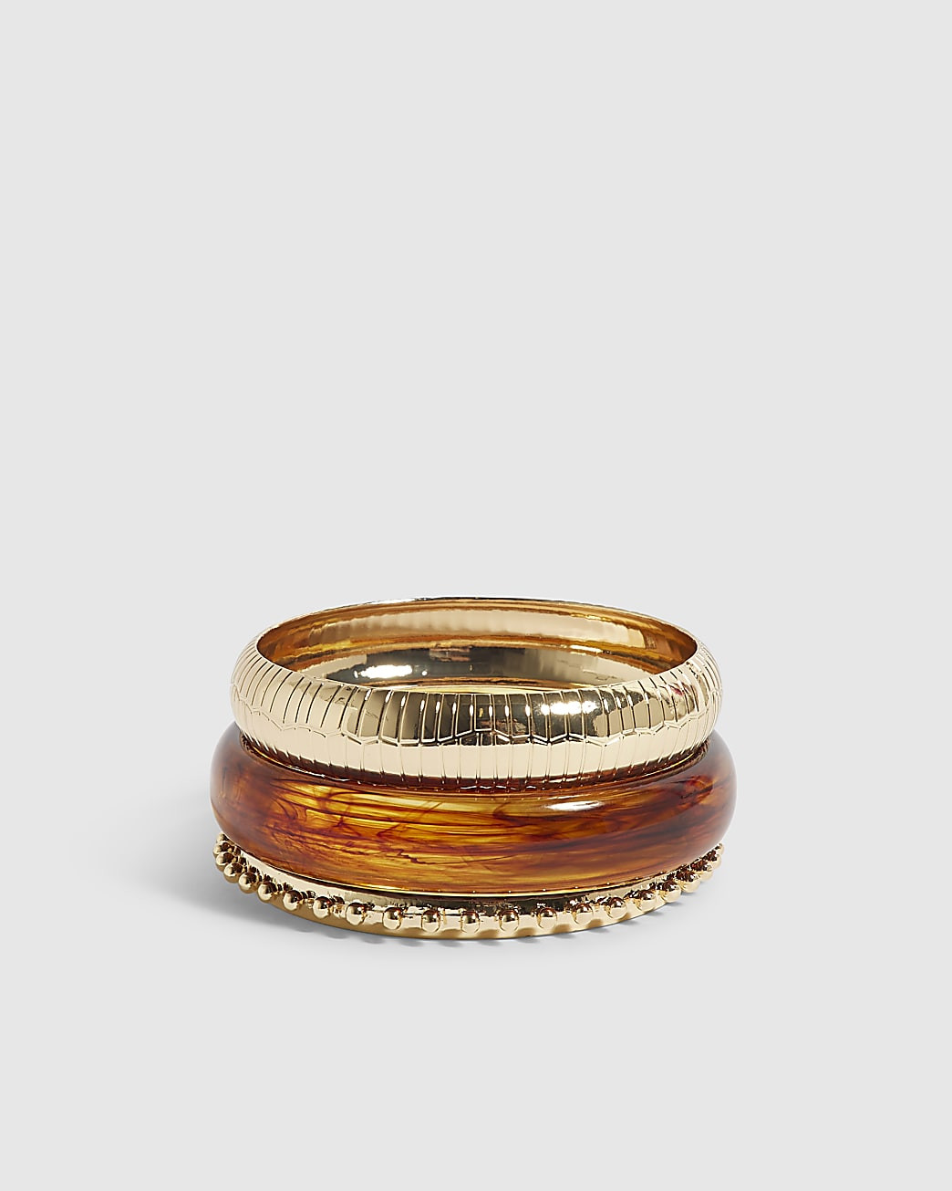 Gold And Brown Resin Bangles Set | River Island UK & IE