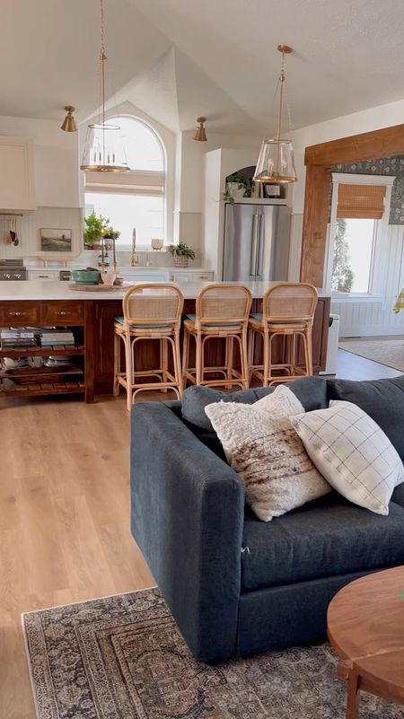 English cottage kitchen on a budget. Rattan boho bar stools, glass cone pendant lights, cheap bamboo shades, affordable faucet and farmhouse sink


#LTKcanada #LTKhome