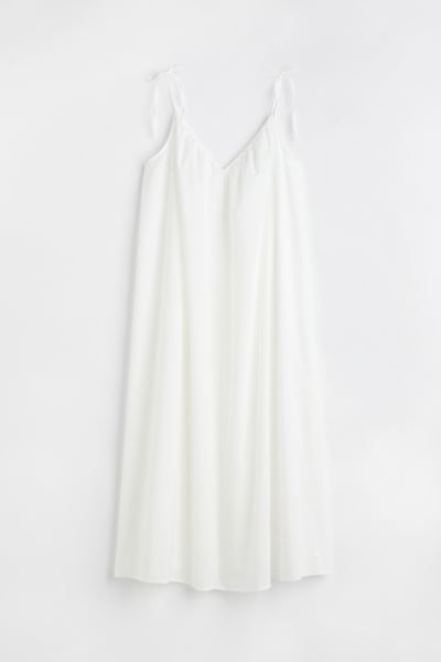 New ArrivalCalf-length, A-line dress in softly draped cotton voile. Narrow, tie-top shoulder stra... | H&M (US + CA)