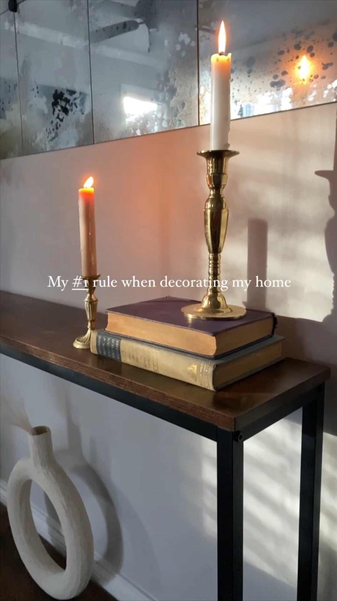 This mantra is what my site was originally built upon! Decorating my apartment on next to nothing budget wise. 

Things have changed a bit over the years but if I can find a deal, I would rather thrift, shop secondhand online, or find a budget friendly version of what I’m looking for. It’s more fun that way! 

✅This new slim console table was $50 on Amazon!
✅The old books were $10 at a secondhand bookstore. 
✅Candlesticks were less than $5 at a Thrift store. 
✅Vase was a diy decoupage project.
✅Donut vase was a diy project. 
✅The flowers were from @dollartree 

What are your home decorating strategies that you use to save money? 💰 Let me know in the Comments below. 👇 

#LTKFindsUnder100 #LTKSaleAlert #LTKHome