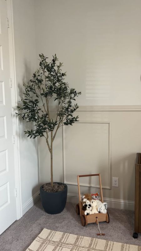 Amazon faux olive tree, planter + moss! Have similar in my office and wanted some greenery in baby boy’s nursery. Love the way it looks in here!! 

#LTKStyleTip #LTKHome #LTKFindsUnder50
