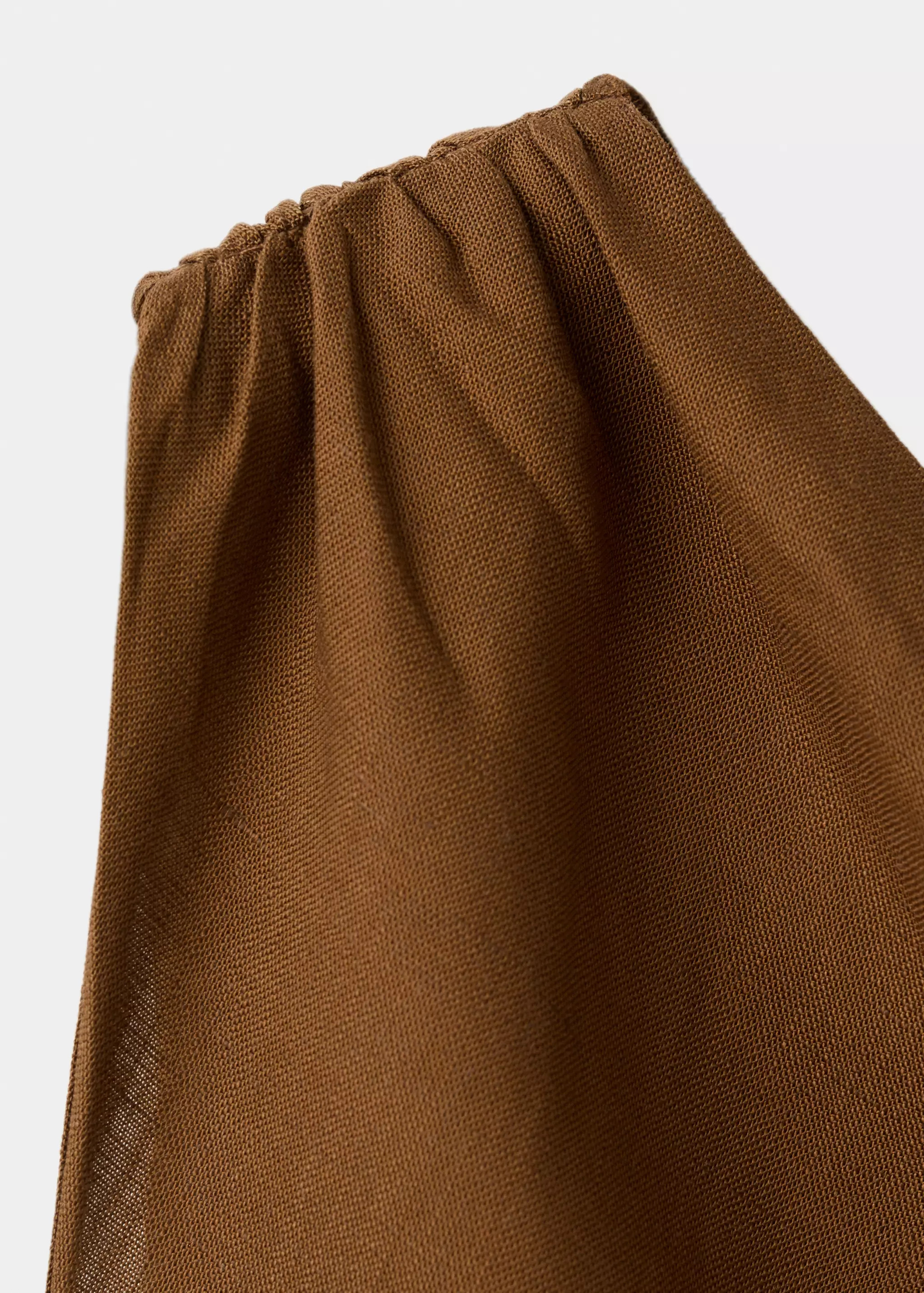 Linen and lyocell blend fabric. Fluid fabric. Long length. Asymmetric design. Fitted design. Wide... | Mango (US/MX/AU)