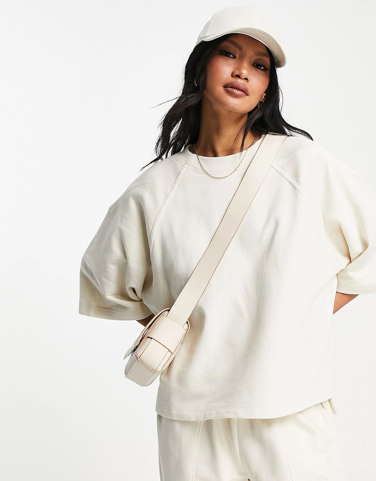ASOS DESIGN short sleeve oversized sweatshirt with paneling in stone | ASOS (Global)