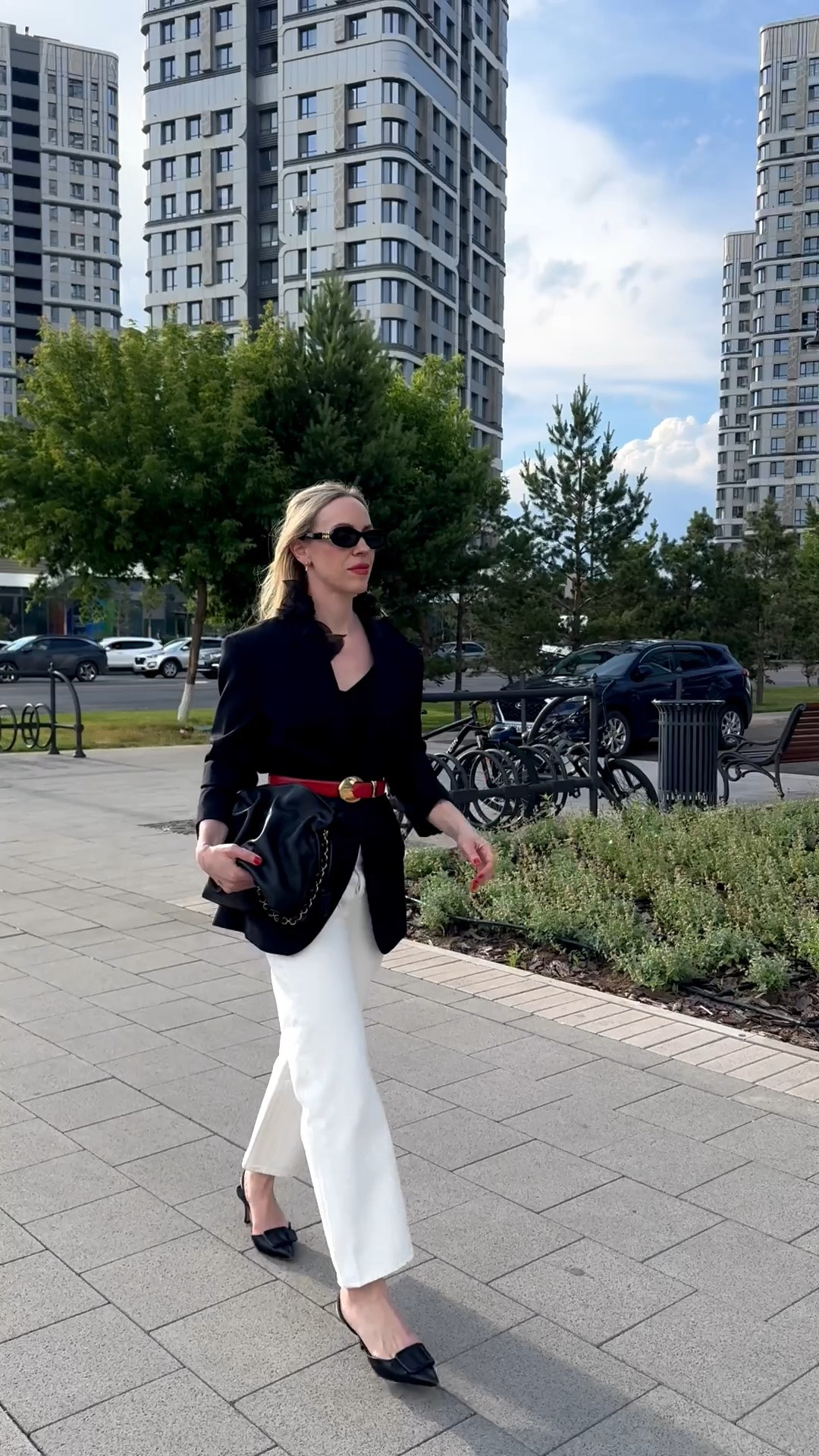Date night outfit with oversized black blazer, @levi white baggy 90’s jeans, red waist belt, slingback pumps

#LTKOver40 #LTKSeasonal #LTKSaleAlert