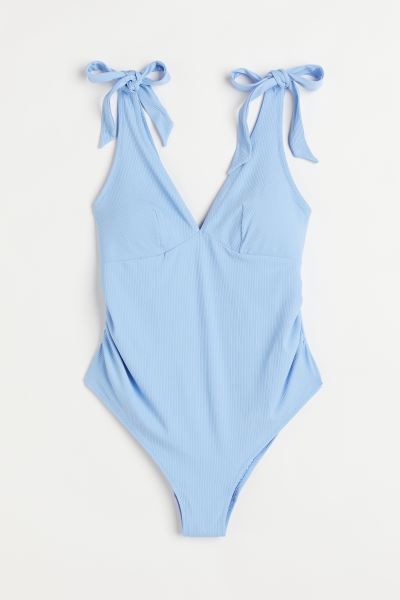 Fully lined, V-neck swimsuit with a gathered seam at each side for comfortable fit over tummy. Wi... | H&M (US)