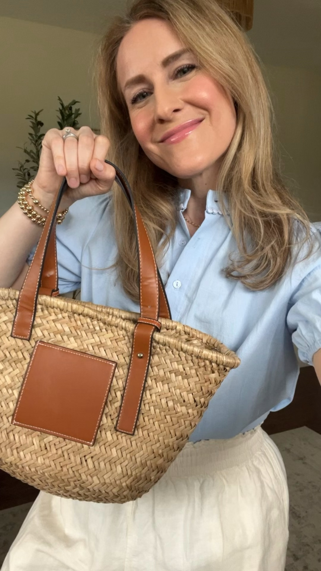 Amazon straw bag with faux leather details, looks like the designer one by Loewe. 
