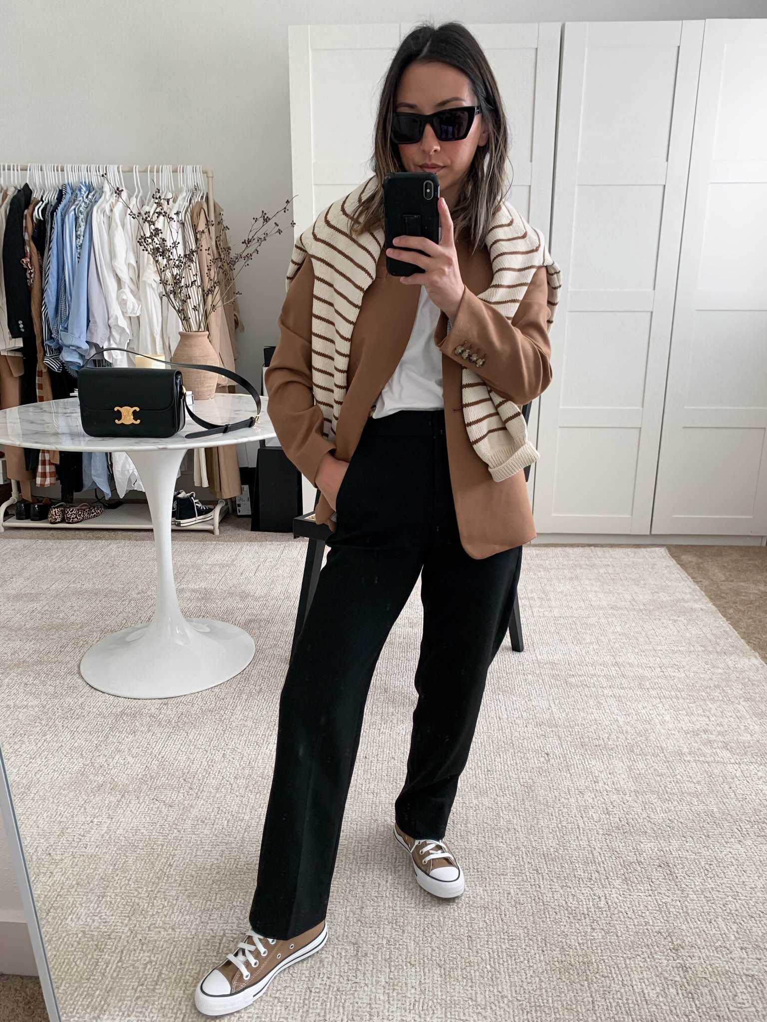 J.crew outfit ideas. Petite, neutral outfits. Regent blazer. How to style black trousers. 

Blazer - j.crew petite 4. Sized up. 
Tee - Everlane medium 
Trousers - J.crew petite 0
Sneakers - Converse 5
Sweater - Sezane small 
Sunglasses - YSL