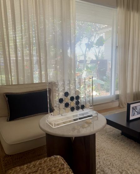 This is our gaming corner in our home, it’s mostly my son and I sitting here at any random moment to play this Connect Four (or backgammon, checkers and more) 🥲 I’ve linked several of the games we have in our home. For some reason, this Connect Four wouldn’t link but you can find it on the CB2 website. #sharingiscaring 😍 

#LTKhome #LTKparties #LTKstyletip