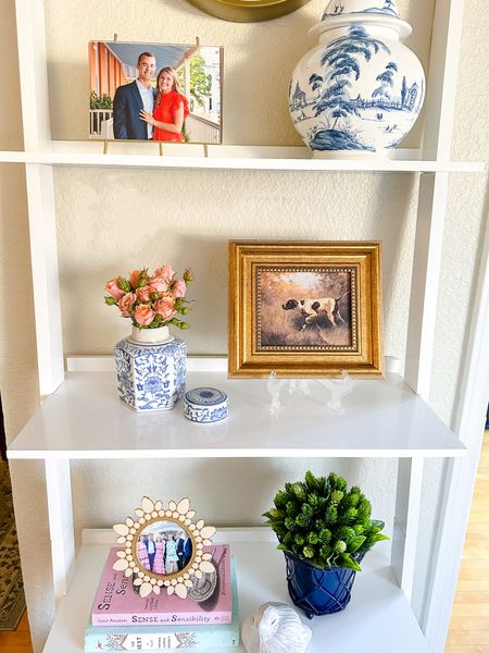 Bookshelf styling! Linked similar for items that are old.

Blue and white // vases // pictures // frames // 

#LTKstyletip #LTKFind #LTKhome