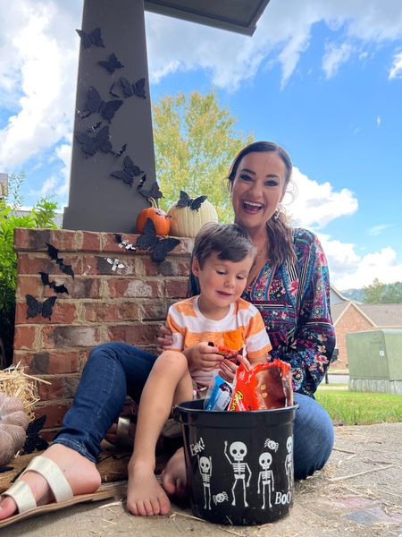 Fall outfits // fall decor // Sharing a few of my favorite Halloween decor below 🎃 My top is so cute for the cold season approaching! Wearing a small! Fits true to size! 

#LTKCon #LTKHalloween #LTKSeasonal