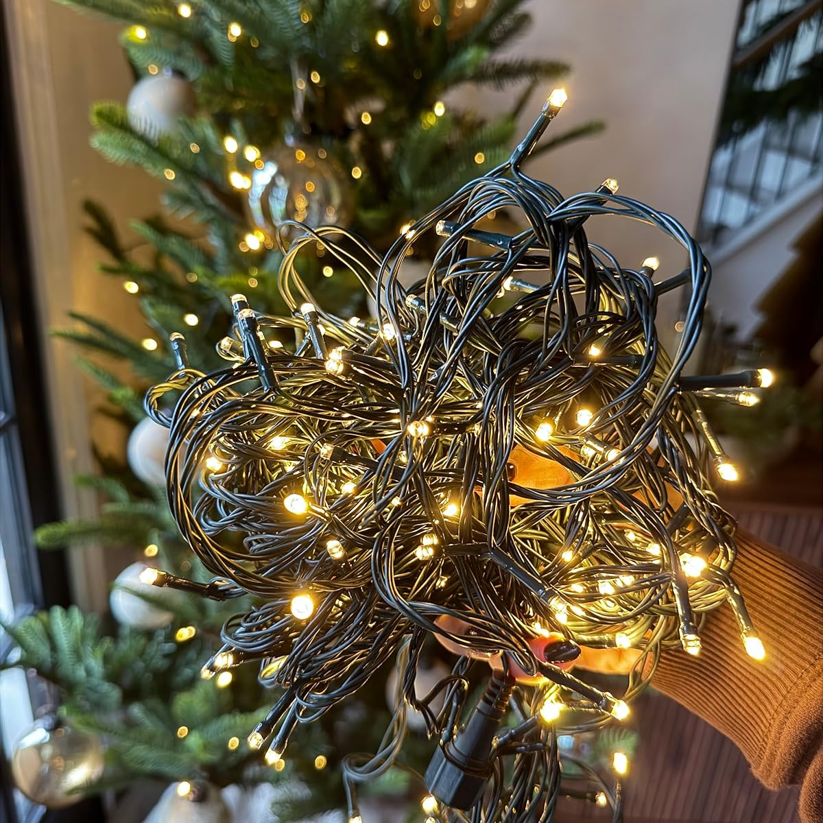 Twinkle tree lights! No need to buy a whole new tree to get that twinkling glow! These lights are the perfect solution! #christmaslights #holidaydecor | Amazon (US)