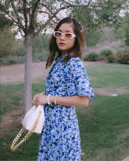 Holiday outfit ideas with blue vibes and butterfly wings sleeves floral dress for spring and summer and holidays, pairs with white bag from Sinbono and crème color sunglasses frame with Amazon 🍂

Wearing size small for the dress from Rihoas 🦋💙 

#LTKSeasonal #LTKunder50 #LTKHoliday