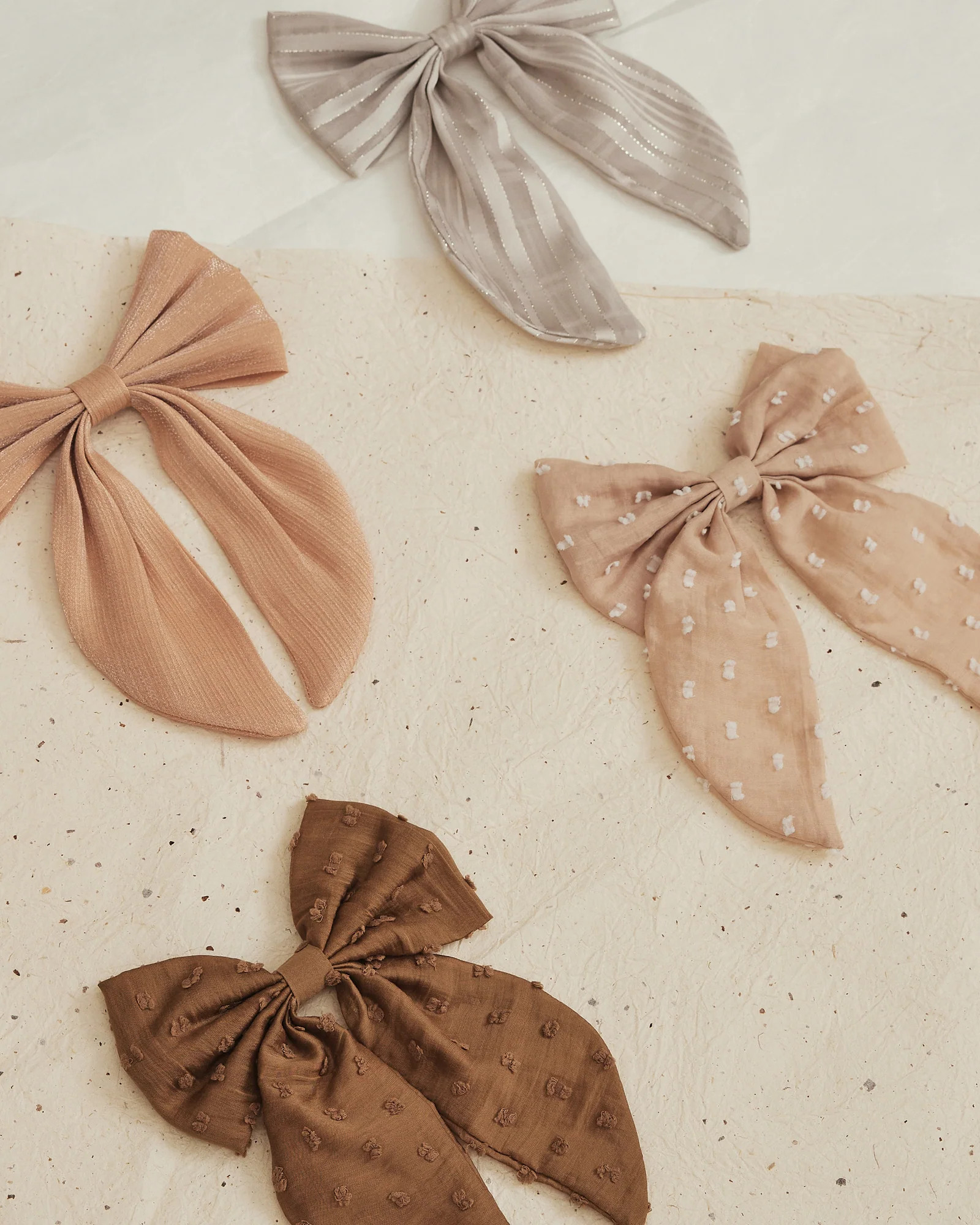 oversized bow | golden fleur | Noralee