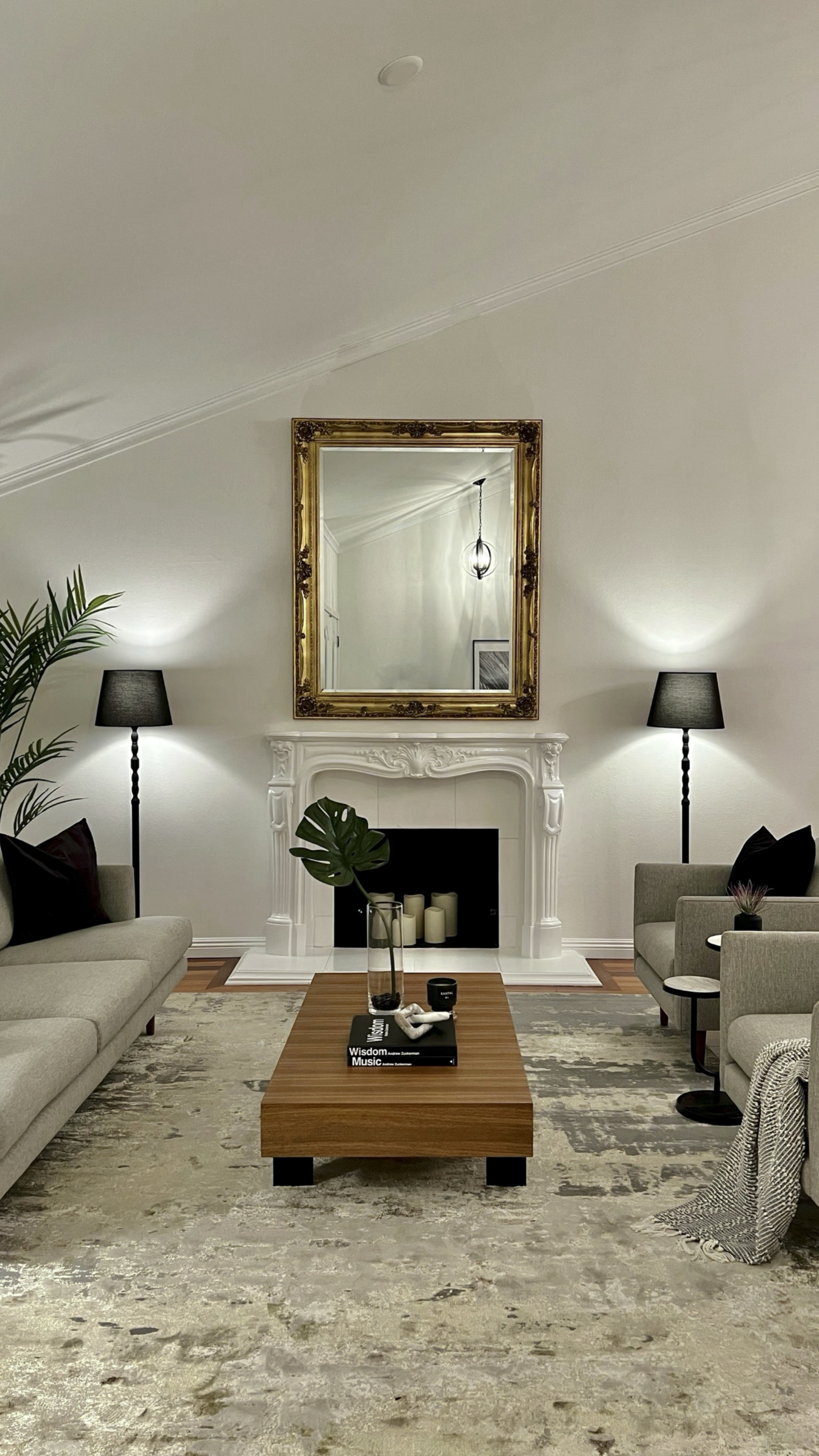 This mirror was planed to be put away for our styling ...
However, we chose to keep it or give it a new home above the fireplace, don't you agree this is a stunning focal piece and sets the tone for the whole room ? 🤩🤩🤩 

We used 2 stand lamps, a mid century modern conversational seating arrangement, viscous rug, and wood coffee table ❤️ #whiteinterior 

#LTKhome #LTKSeasonal #LTKstyletip