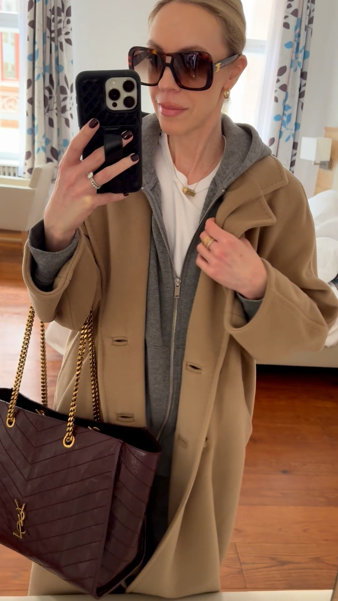 Casual chic travel look, airport outfit, gray hoodie sweatsuit, camel coat, burgundy YSL tote bag

#LTKSeasonal #LTKTravel #LTKOver40