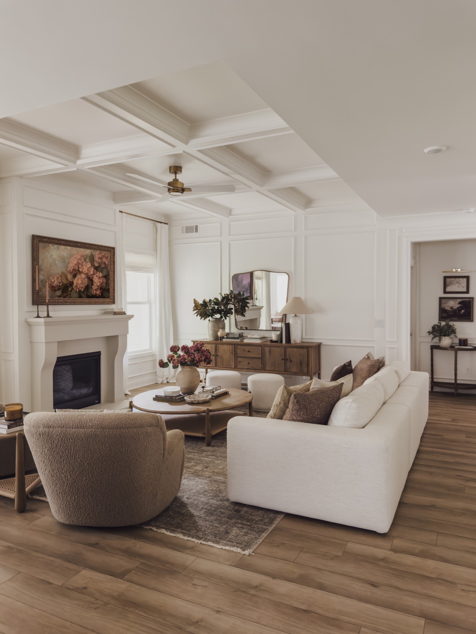 Fall living room details with all of the moody, collected vibes for the season! Loving these darker tones and stunning faux florals for an easy and intentional fall transition.

Home finds, neutral home inspo, collected style, fall refresh, living room details, cozy accent chair, upholstered sectional, oversized coffee table, sideboard details, neutral area rug, accent table, fall florals, Nancy Meyer’s vibes, faux magnolia stems, Wayfair, Castlery, Four Hands, Visual Comforts, Loloi, Amber Lewis, open concept living room, shop the look!

#LTKHome #LTKStyleTip #LTKSeasonal