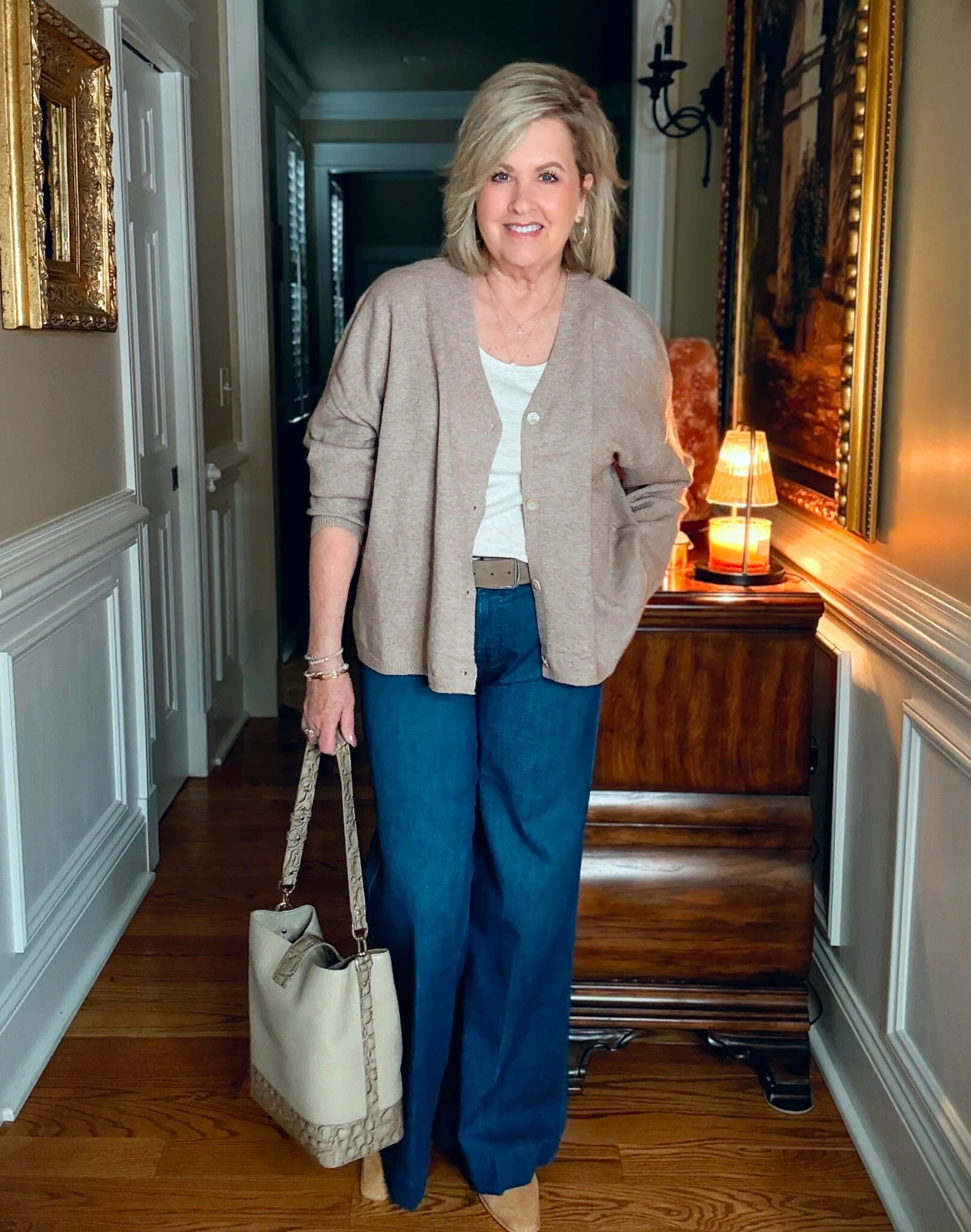 Here is a great way to style wide leg jeans for Fall! My sweater is a size large and the wide leg jeans are an 8. 

#LTKStyleTip #LTKWorkwear #LTKOver40