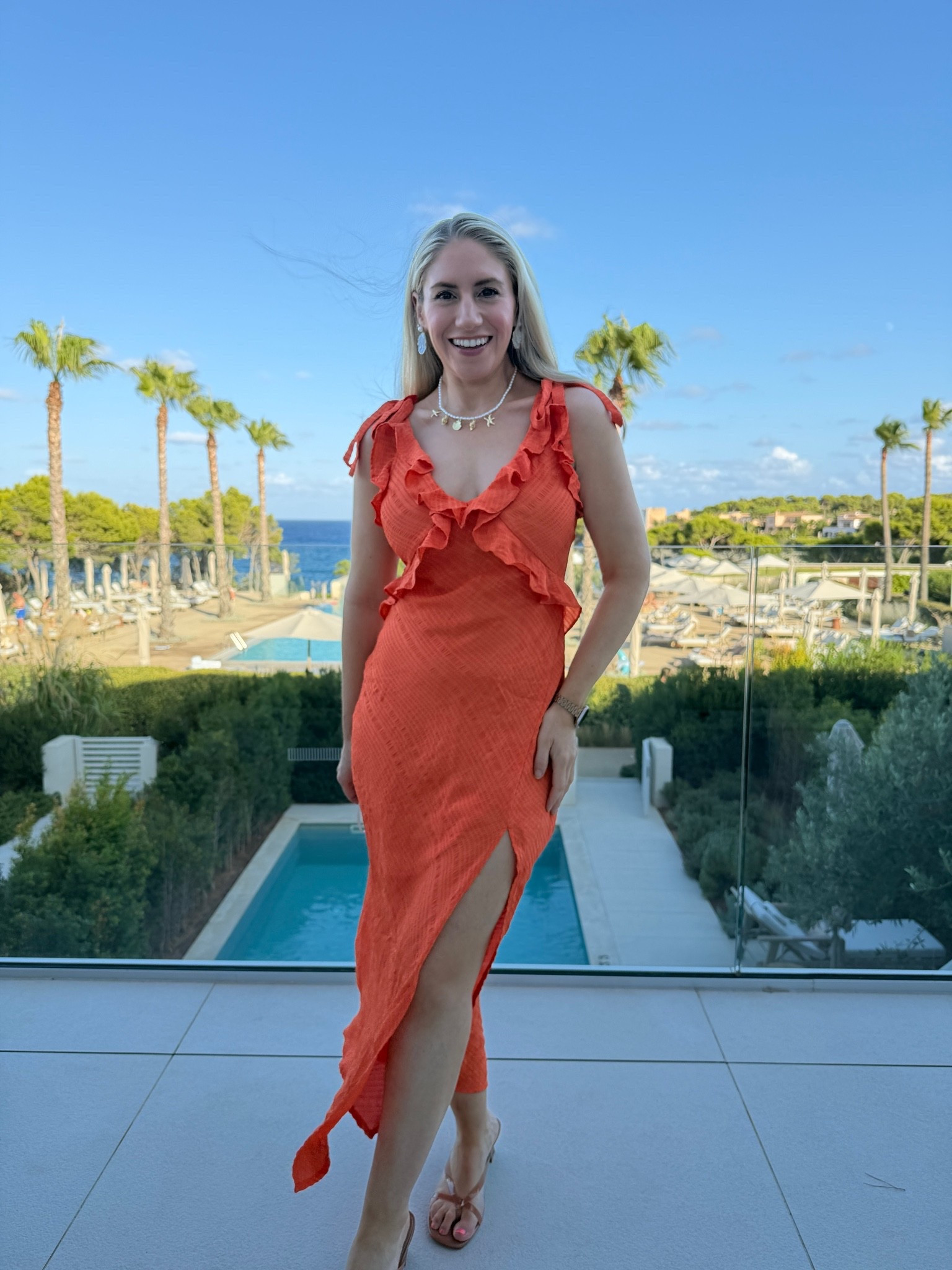 Stunning orange ruffle dress, so fun and easy for vacation and going out! Long dress, high slit! Sexy and pretty

#LTKTravel #LTKPetite #LTKWedding