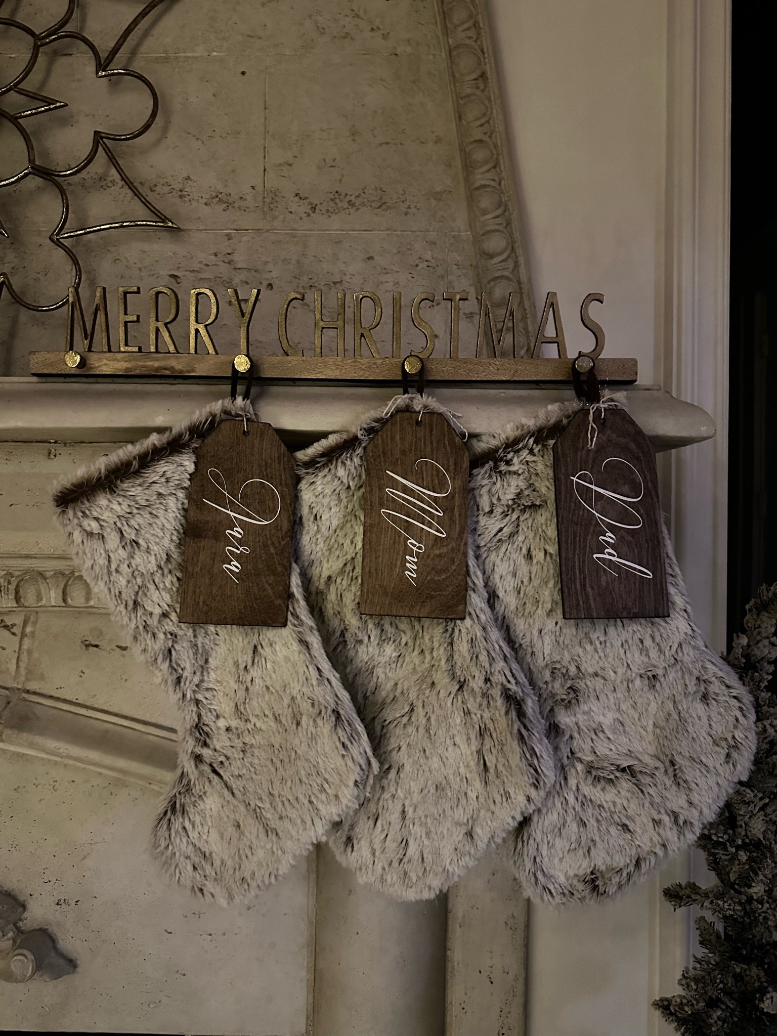 And the stockings were hung! This year I went with soft, fur stockings and added my wooden tags to them. Links are 👇🏽

#christmas #merrychristmas #holidaydecor #christmasdecor #home #homedecor #cozyvibes #amazon #homegoods

#LTKstyletip #LTKHoliday #LTKSeasonal