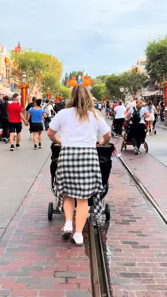 Midsize Disney Outfit 🏰🐭✨ I really leaned into wearing basics for this trip and then accessorizing with cute stuff I picked up in the parks like hats, ears, and bag charms 🫶🏻 Most of these items I’ve had for years so I tried to link something similar or in a different color  

#LTKFindsUnder100 #LTKTravel #LTKMidsize