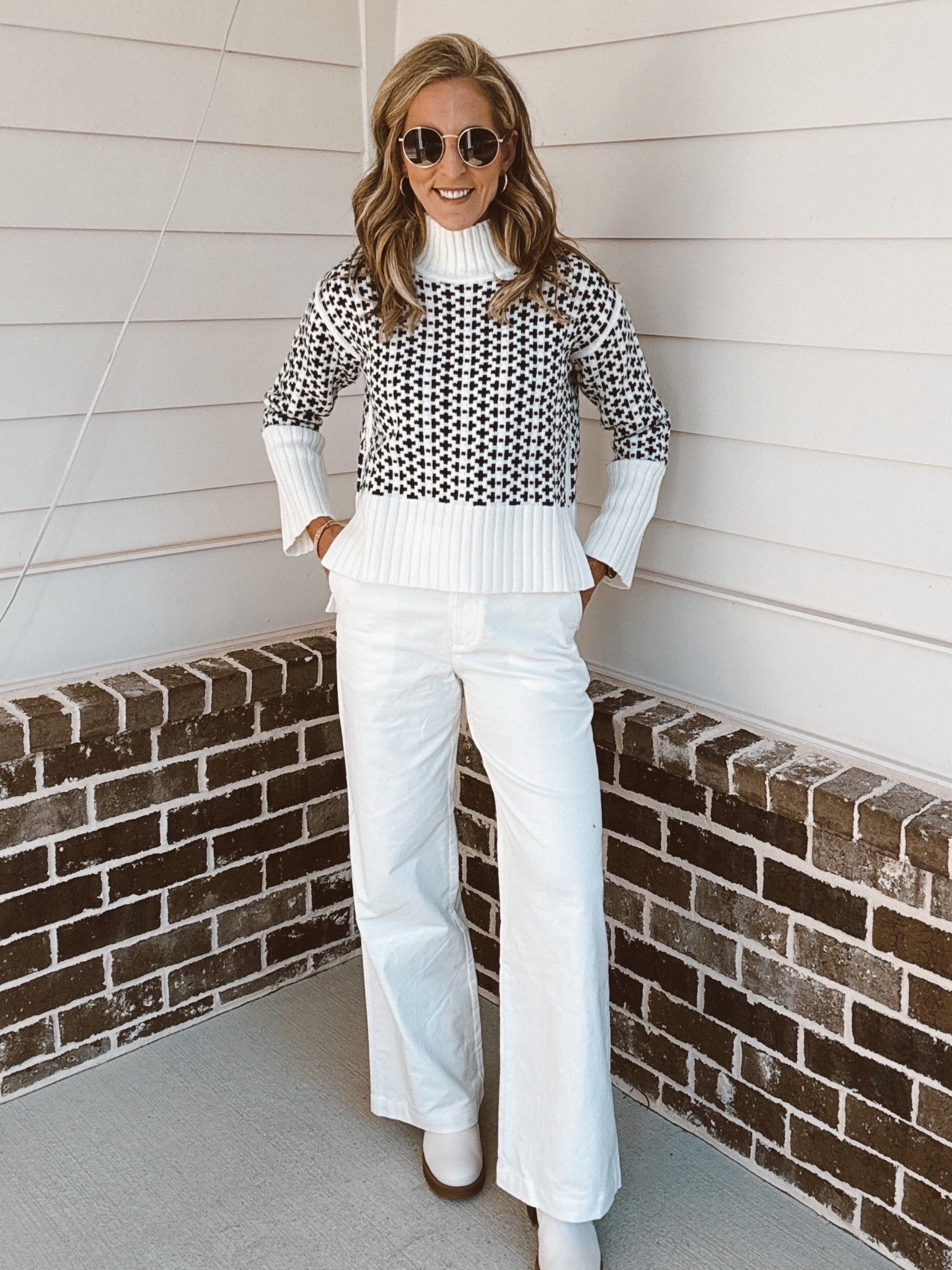Walmart brought back one of my favorite free assembly sweaters. The sweater comes in cream and navy, darkest, navy, and gray the perfect sweater with a striking pattern frame and exaggerated, ribbed cuffs and hem - wearing a size small linked up some pant options 