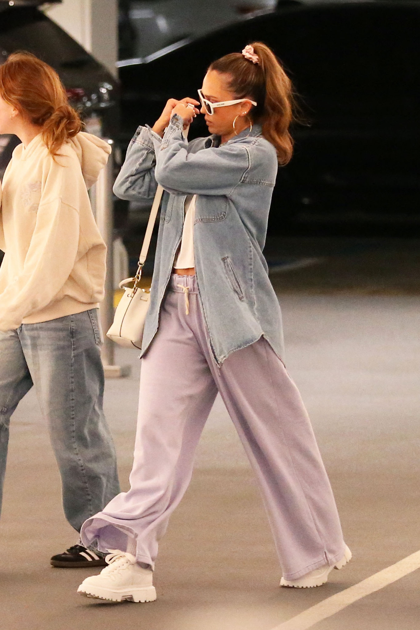 Shop Jessica Alba lavender purple color wide leg sweatpants, denim chambray shirt Shacket white sneakers, white wayfarer sunglasses, white cropped tee, white leather mini bucket bag #JessicaAlba #CelebrityStyle

#LTKFindsUnder100 #LTKFindsUnder50 #LTKStyleTip