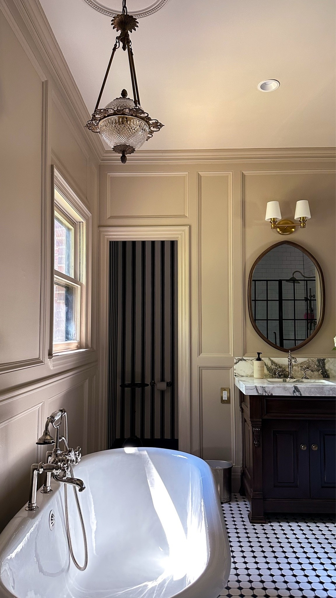 There’s something about a bathroom that actually feels considered. This one took a while to get there, but every piece — the marble vanity, the brass sconces, the antique-style fixtures — was chosen intentionally. Nothing was the default. Shop everything linked above.

#LTKHome #LTKmorningroutine #LTKselfcare