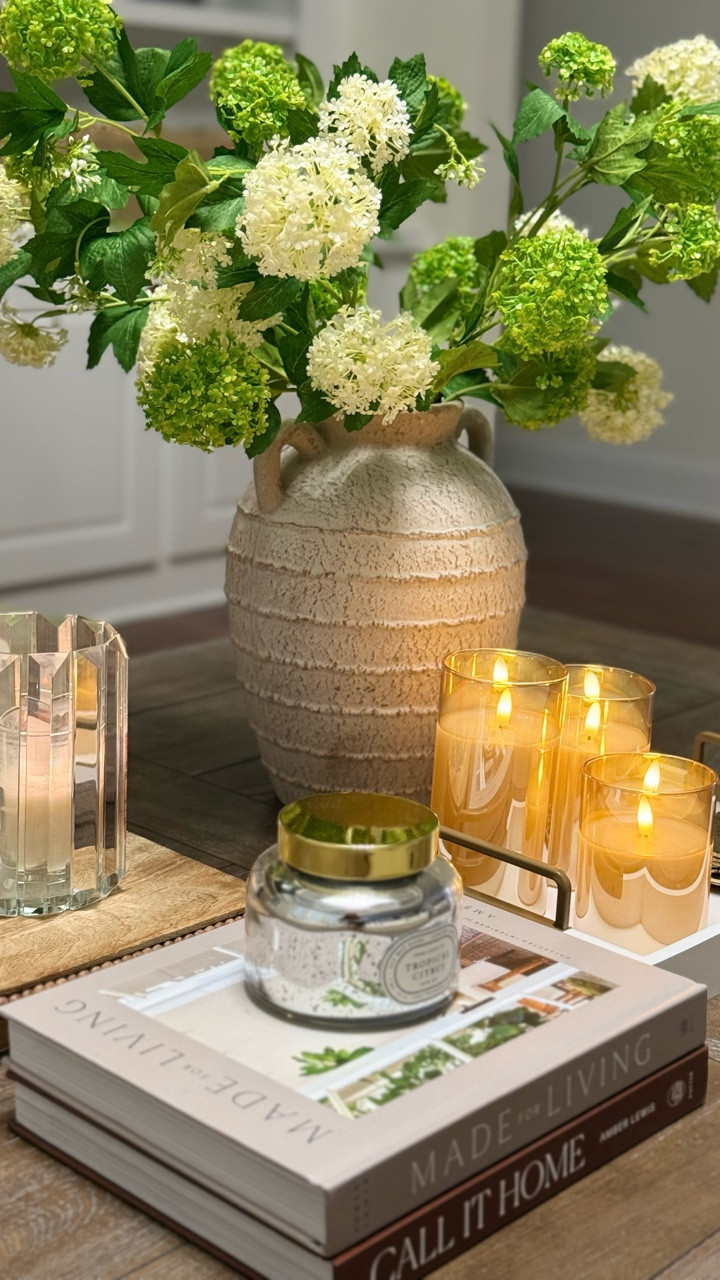 Follow + Comment “COFFEE TABLE” and I’ll send link straight to your DMs!

Restyled my coffee table for summer! The hydrangeas flowers are one of my favorite stems ever! 

Shop everything on my LTK @familyfabfour and don’t forget to follow for app exclusive content.

#coffeetabledecor #coffeetablestyling