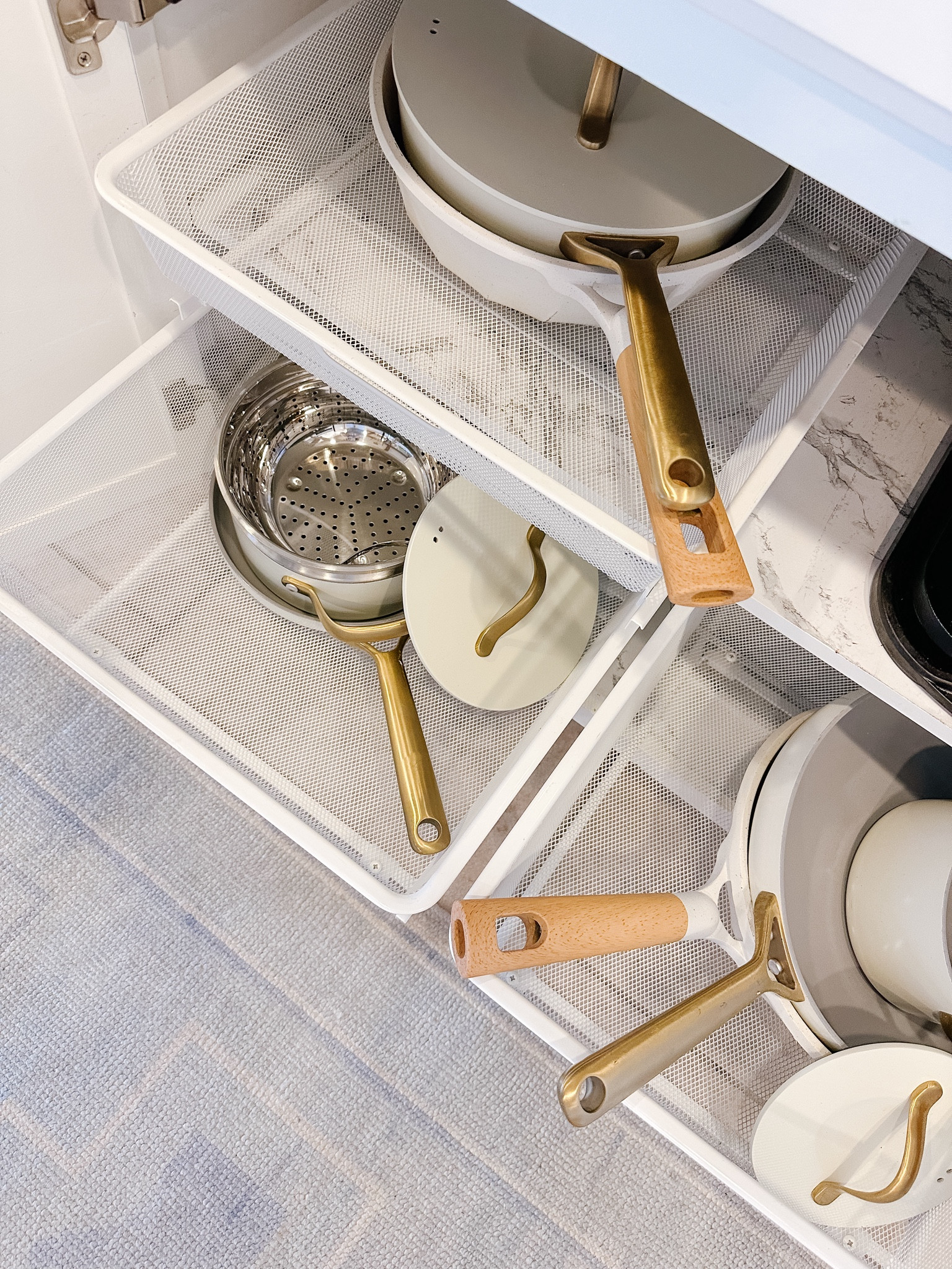 Sale on my favorite kitchen organizers! They are currently 30% off 🙌🏼 I love using them for my pots and pans but they could definitely be used in a pantry space as well. Comment ORGANIZE for a link sent to your DM. 

#LTKhome #LTKVideo #LTKsalealert