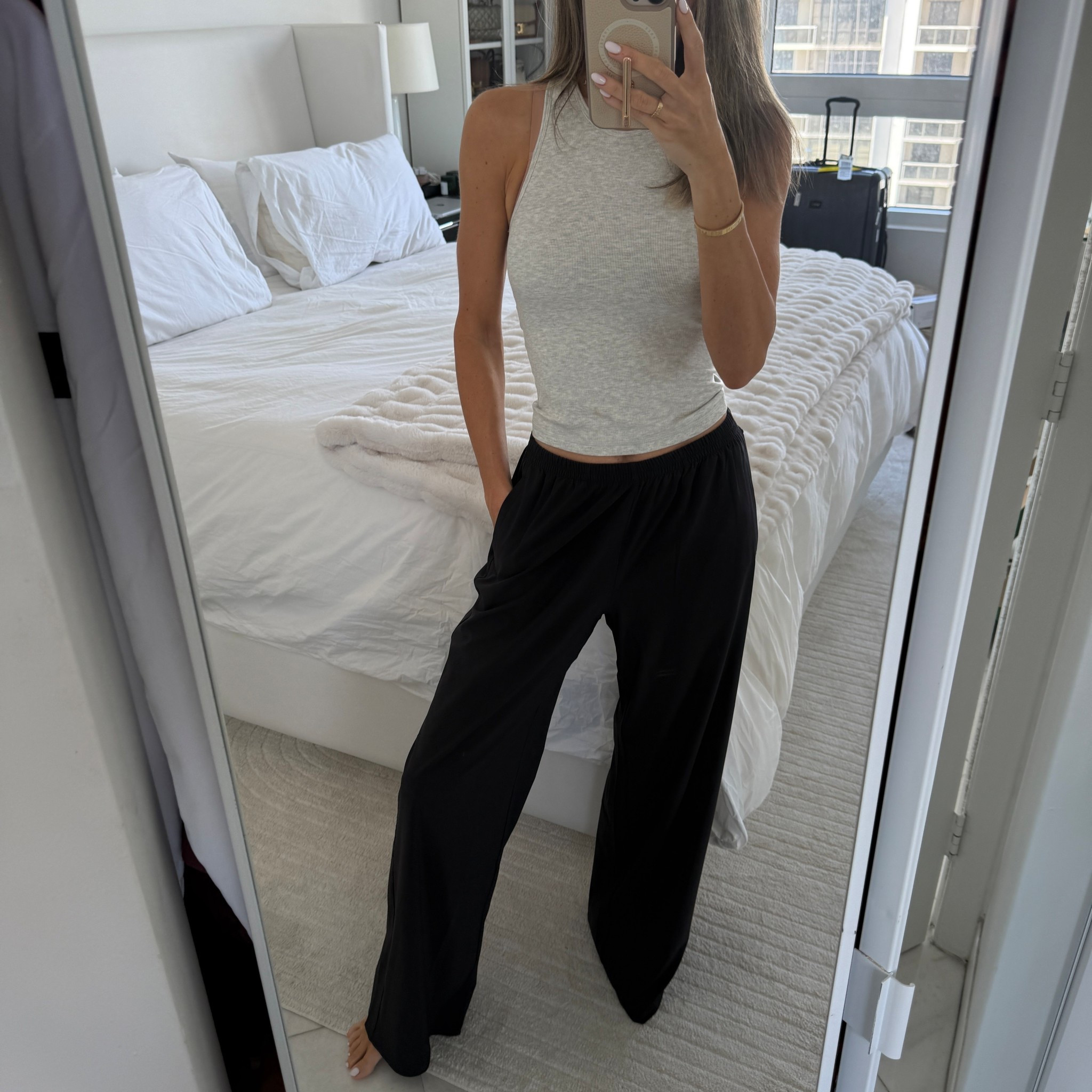 pp post #1 caption:
Wearing the Villa Everyday Wideleg—this is perfect for summer and wrinkle-resistant which is great for traveling. They also come in multiple inseam lengths. Color: black and wearing a size small. @vuoriclothing #vuoripartner

#LTKootd