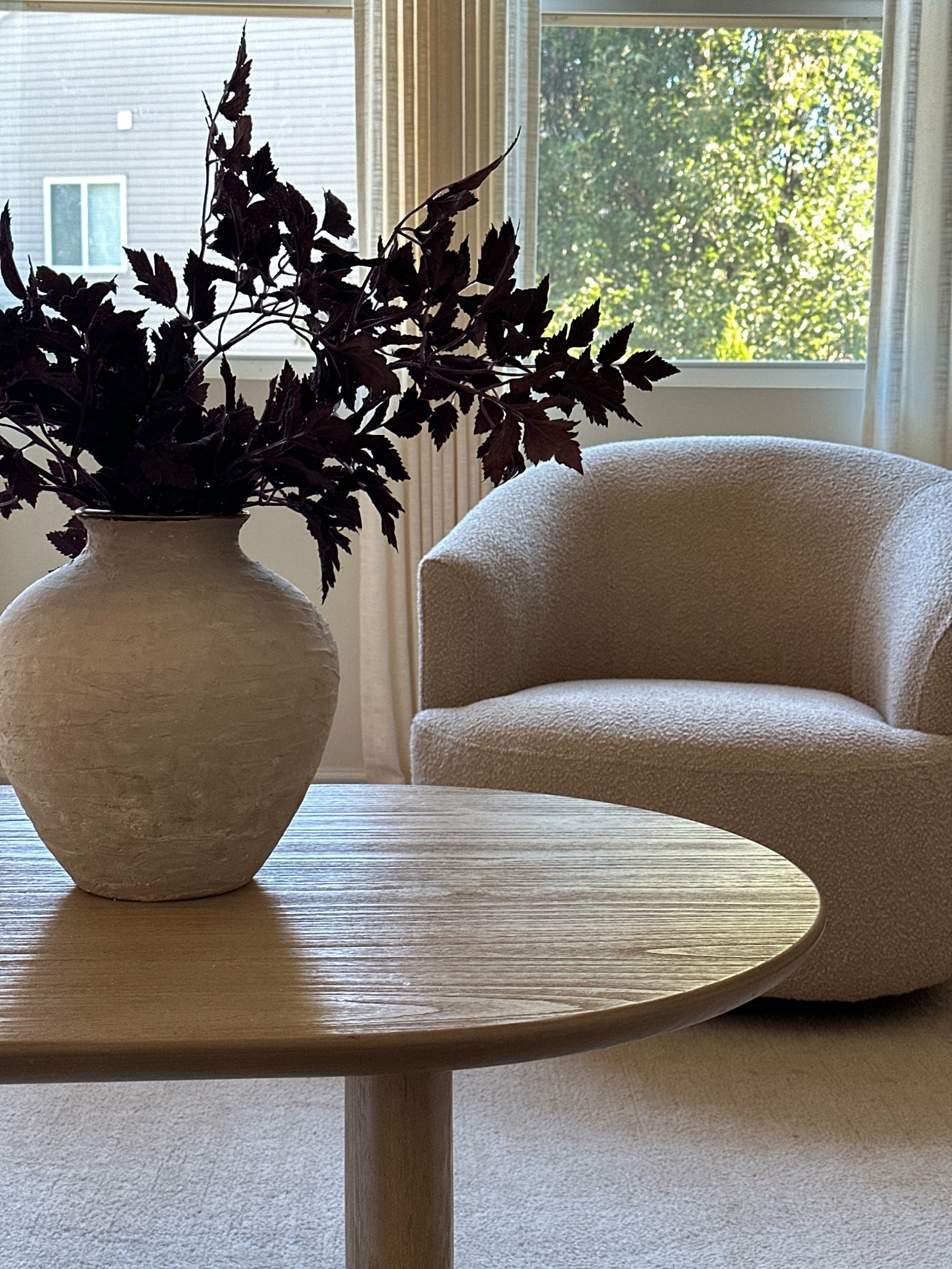 Moved my Walmart chair down to my living room and got a second because I loved it so much!

Boucle swivel chair, oval coffee table 

#LTKHome