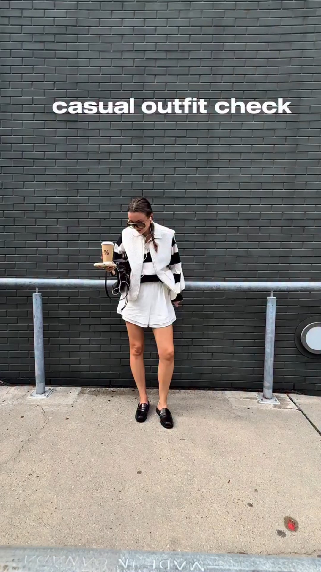 extremely casual outfit check 🤓

Vest, sunglasses, loaffers @hm 
Striped long sleeve @zara
Shorts @commense.official 
Bag @cosstores 
Earrings @winners 
Parfume @aerinbeauty 
Lipstick @maccosmeticscanada 
Coffee @arabica.ca 

Fashion | outfits | look of the day | fall fashion | outfit idea | Ugc | content creator | influencer 
Casual outfit | ootd