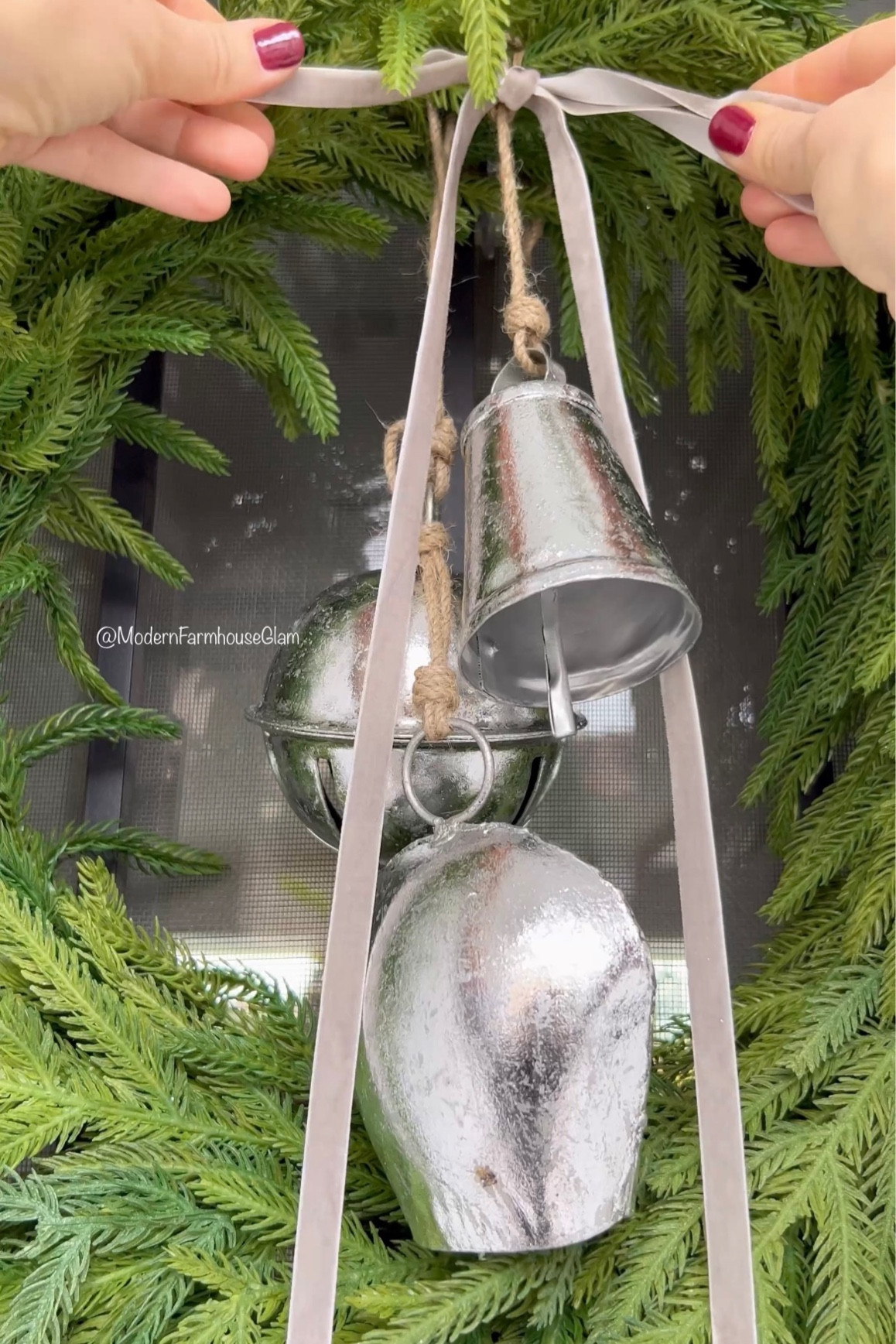 Christmas wreath on front door at Modernfarmhouseglam with Silver Bells and silver velvet ribbon Christmas decor, holiday decorations Pine Garland 

#LTKSeasonal #LTKHoliday #LTKhome