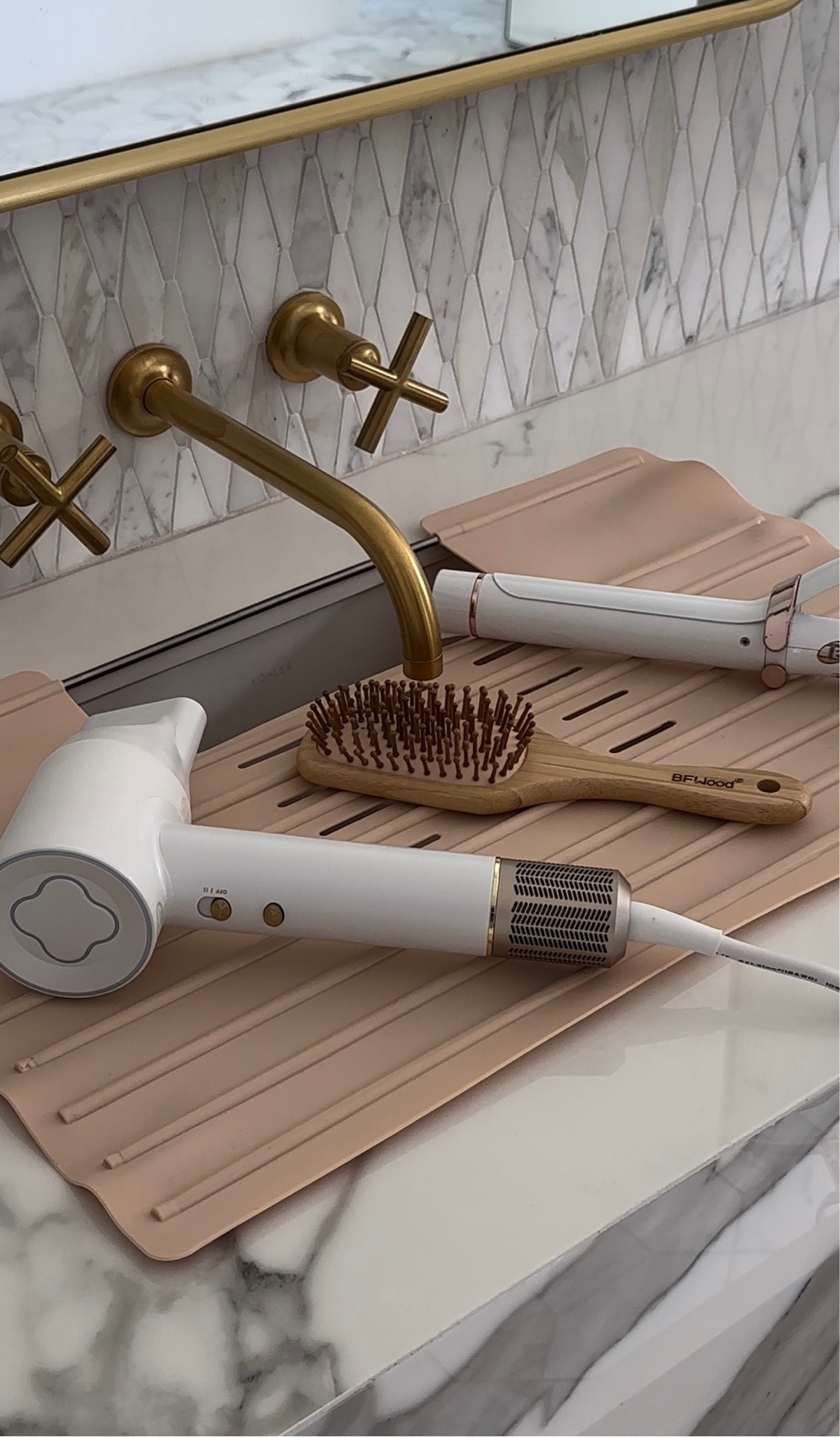 Tap any photo below to shop!! Create extra counter space in your bathroom with this over-the-sink silicone mat!!! 🤩✨ The ridges in the mat hold makeup products in place and since it’s heat resistant, it’s safe for heated hair tools!!! 🪮💄 I ordered it in the color beige!!! Hope you’re having the most amazing day, amazing girly!! Xo! 💖

#LTKbeauty #LTKhome #LTKfindsunder50