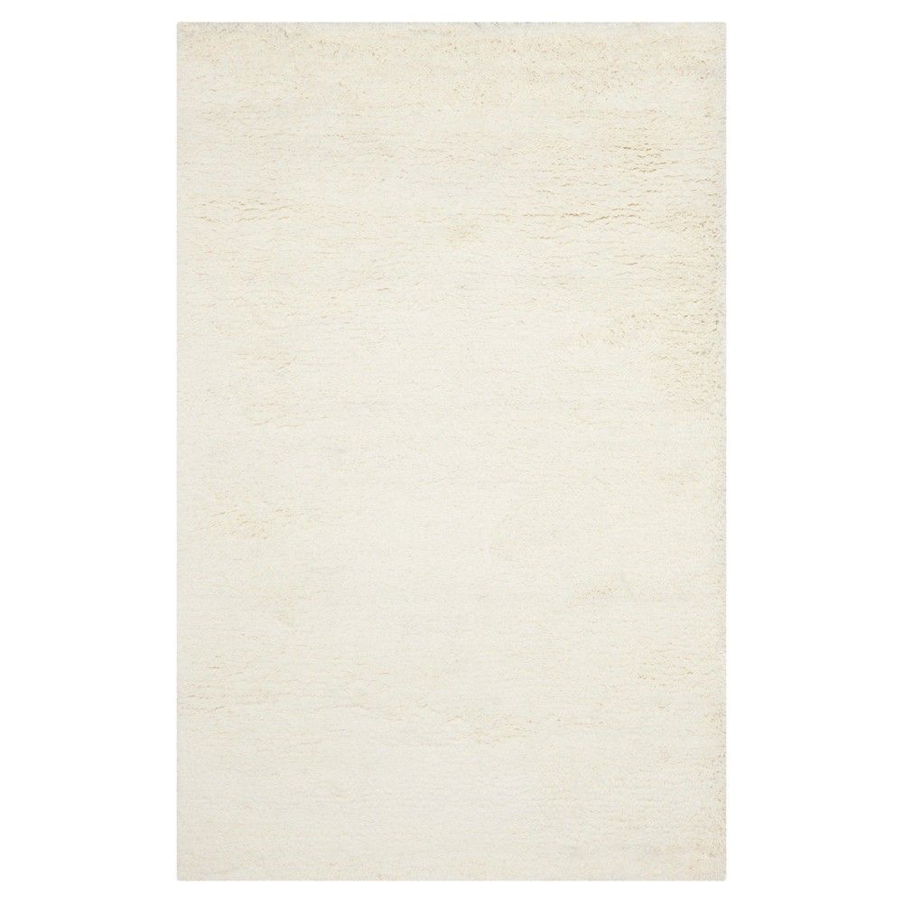 White Solid Shag and Flokati Tufted Area Rug 5'X8' - Safavieh | Target