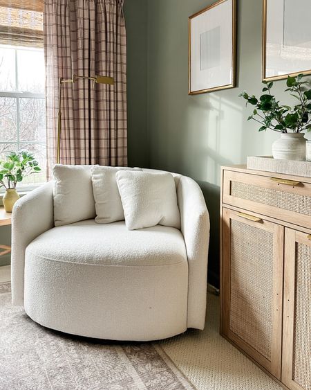 Cozy corner finds: oversized swivel chair (went viral!), rattan cabinets, pretty brass frames, curtains, faux greenery, vintage style floor lamp 



#LTKhome #LTKSeasonal #LTKstyletip