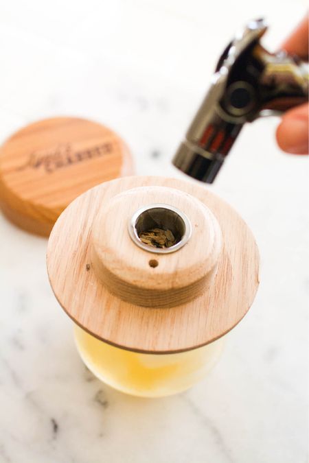 Smoked cocktails is so on trend but I’m lazy and don’t want to deal with tubes and tons of large equipment. This cocktail smoker fits on a glass and couldn’t be easier! If you love making cocktails at home, you’ve got to try this! It also makes a great gift for whiskey lovers! 

#cocktails #cocktailsmoking #giftidea #whiskey #amazon #bartools

#LTKhome