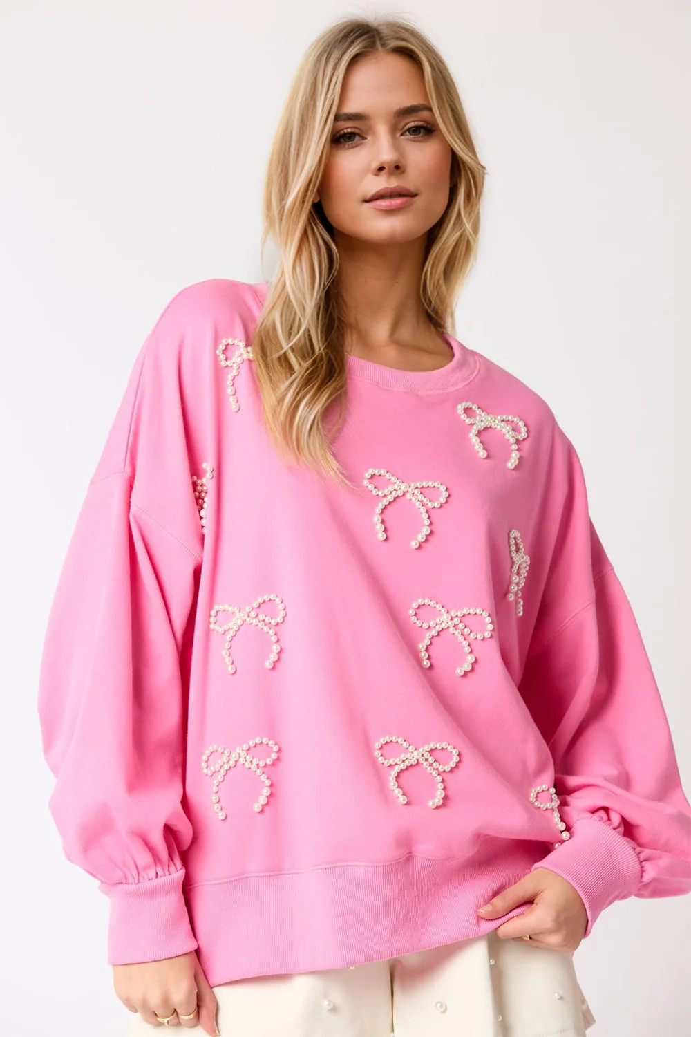 Pearl Bow Round Neck Dropped Shoulder Sweatshirt Pink / S | Casual Chic Boutique