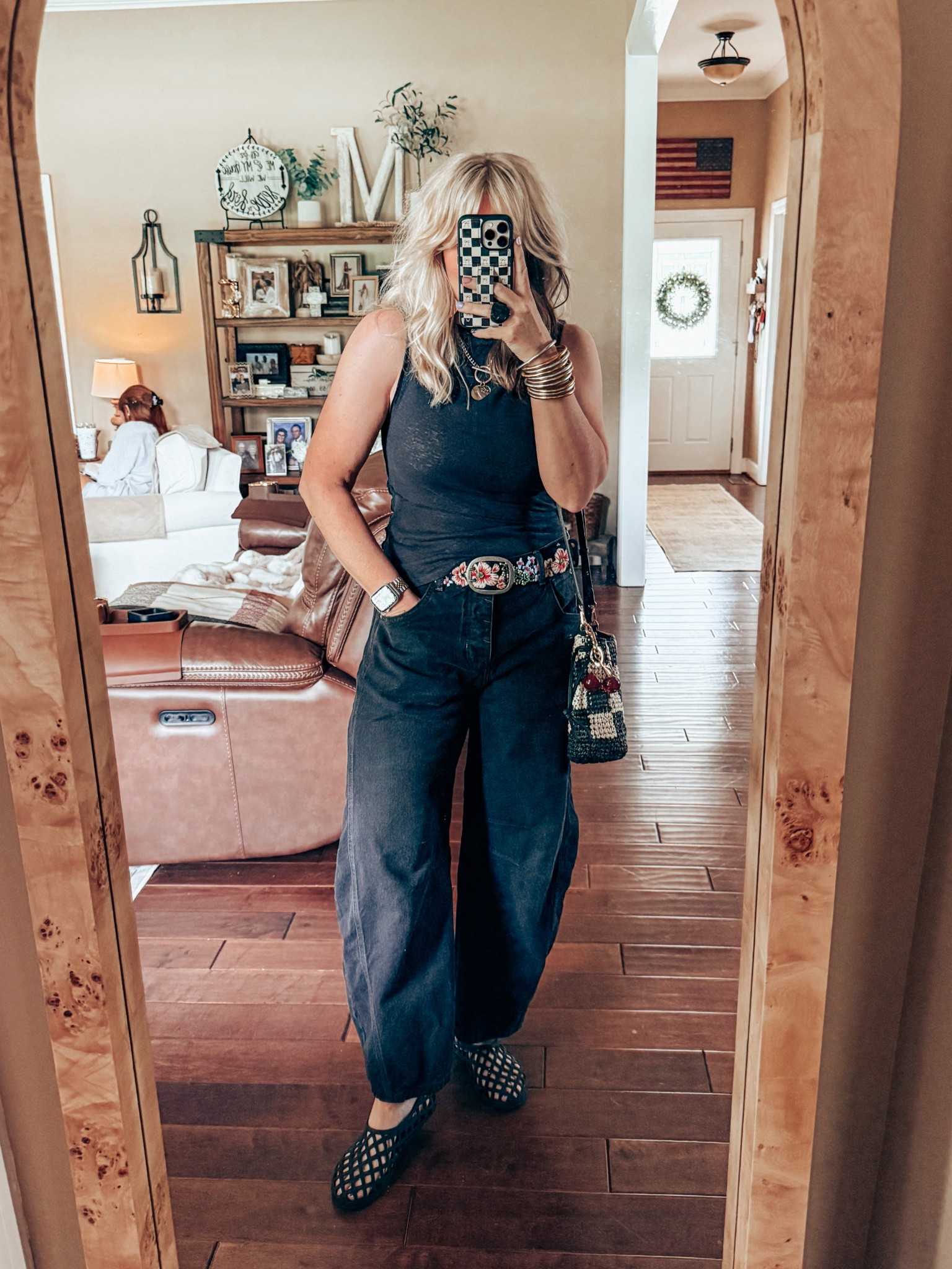 Love a black on black look! 😍
Top - M
Belt - M 
Jeans - true to size 
Jelly shoes - true to size 

#LTKShoeCrush #LTKStyleTip #LTKFindsUnder100