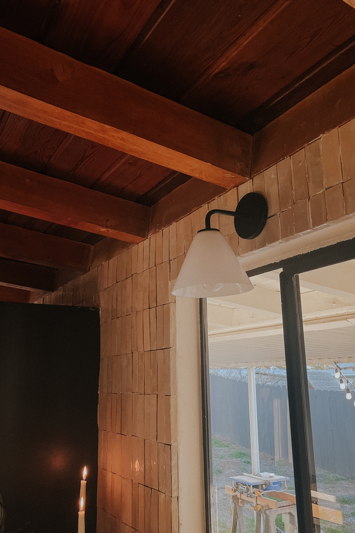 Cute little sconce! I wanted something simple since this wall has a lot going on with the tile. We ordered milky glass with a matte black base. 

#LTKhome