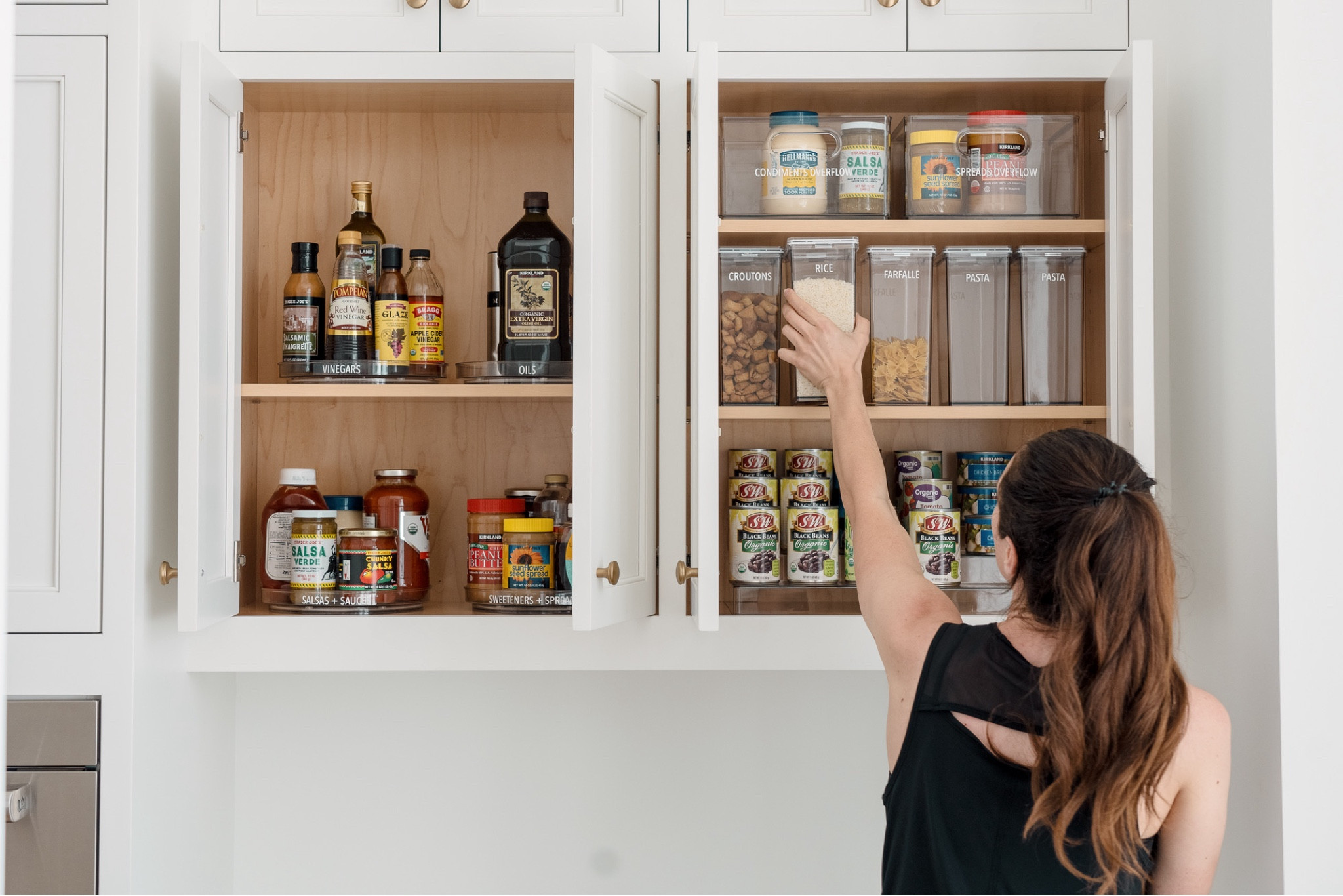 An elegant organized kitchen using acrylic canisters and turntables 
#organized #kitchen #simplicity

#LTKhome #LTKfamily