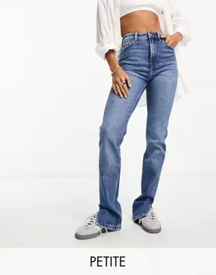 Bershka Petite split hem flared jeans in mid blue | ASOS (Global)