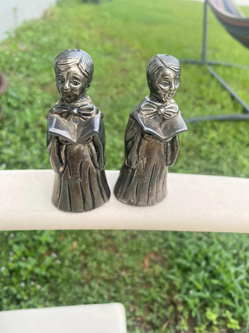 Vintage Godinger Silver Art Co. silver-plated salt and pepper shakers in a choir boy design. | Etsy (Global)