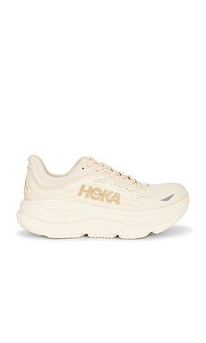 HOKA Bondi 9 Sneaker in Vanilla & Birch from Revolve.com | Revolve Clothing (Global)