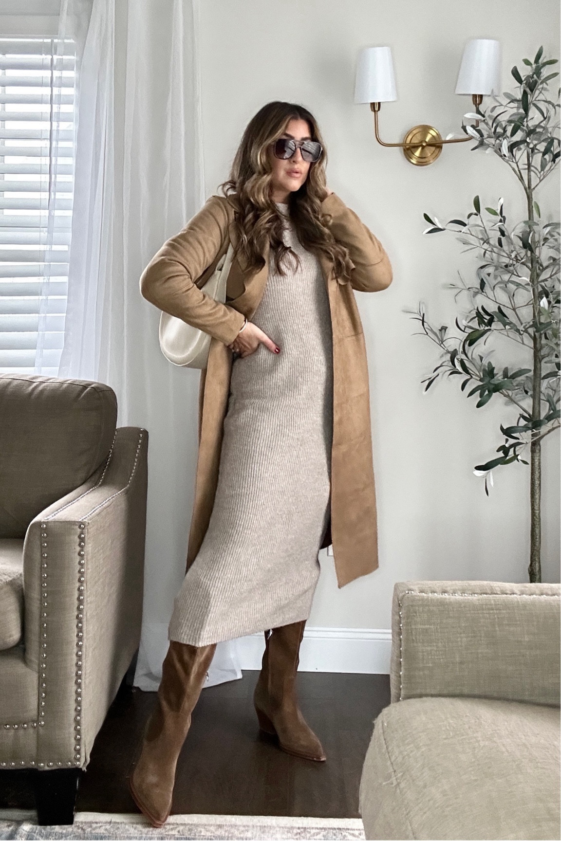 Loving this long neutral midi/maxi sweater dress. I think it makes the perfect transition piece from winter to spring. Because it’s still cold out I paired here with my fleece-lined tights, suede boots and trench coat. Linked up similar ones at different price points! Use my code LAUREN20 for 20% OFF @thesiskiss on custom jewelry- perfect Valentine’s Day gift idea! Winter outfit. Xx

Wearing small in all.

#LTKstyletip #LTKMostLoved #LTKfindsunder100