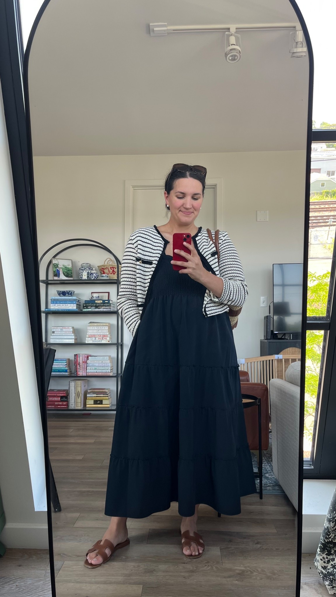 What I wore today as a 33-year-old who works from home and loves classic style. 🤍

I’m wearing:
• White and Knit Cardigan from H&M (Size Large)
• Black Hill House Home Nap Dress (Size Large)
• Brown Hermes Oran Sandals
• Brown Demellier Santorini Bag
• Krewe Lucy Sunglassess

#LTKMidsize #LTKFindsUnder100 #LTKFindsUnder50